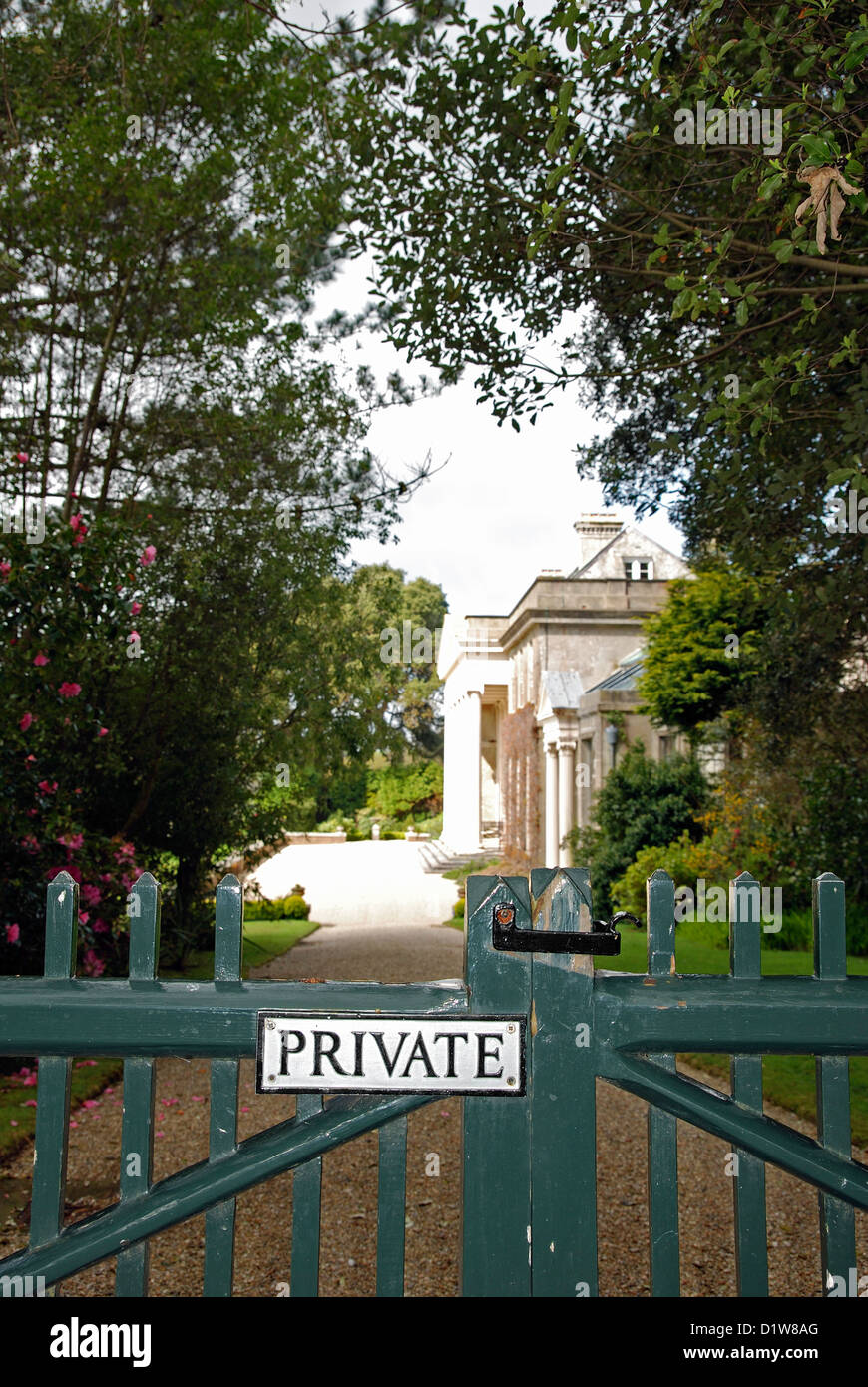 A private sign on the gate of a large house Stock Photo
