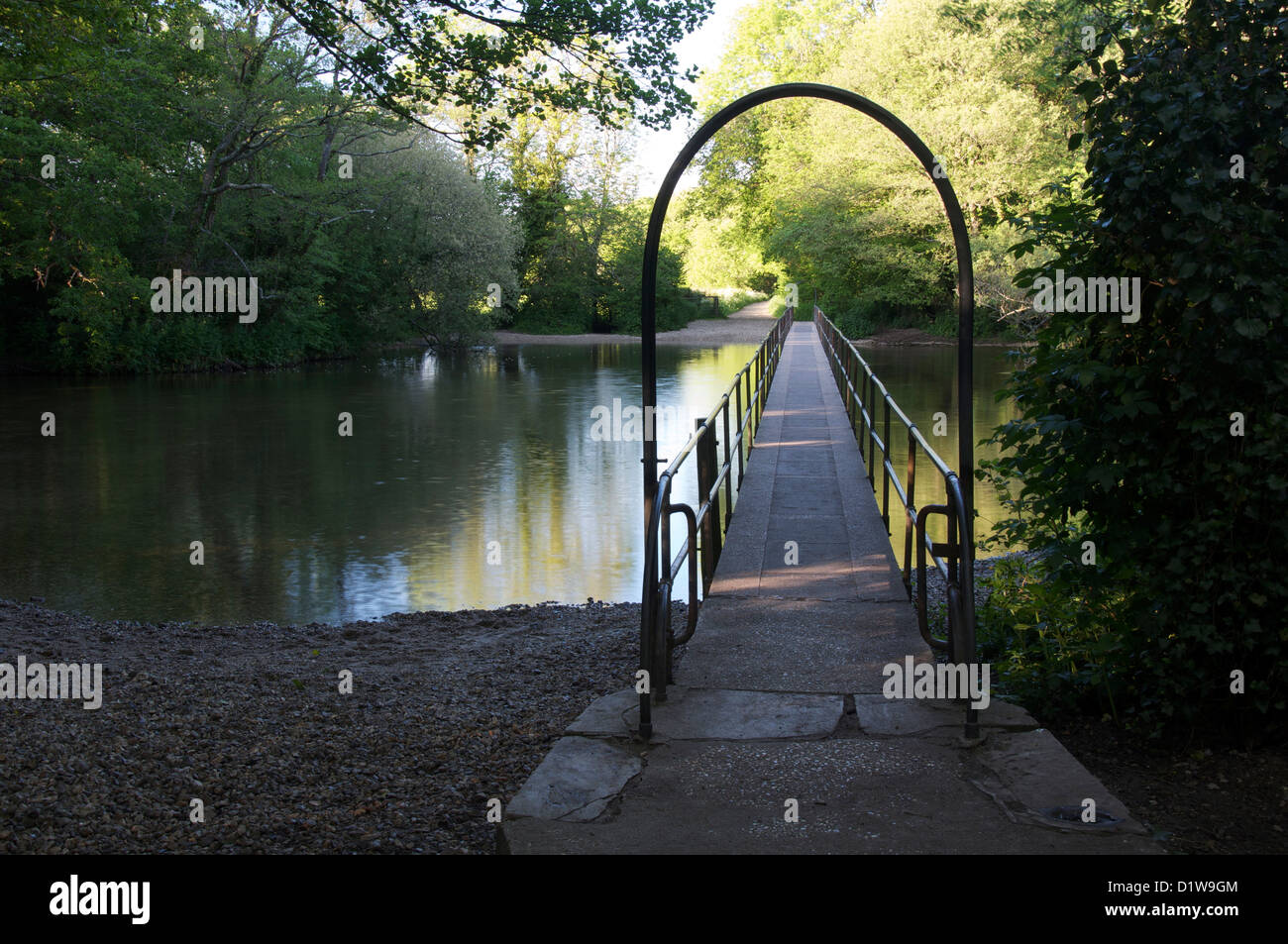 A tranquil summer evening by the ford at Moreton. A long pedestrian