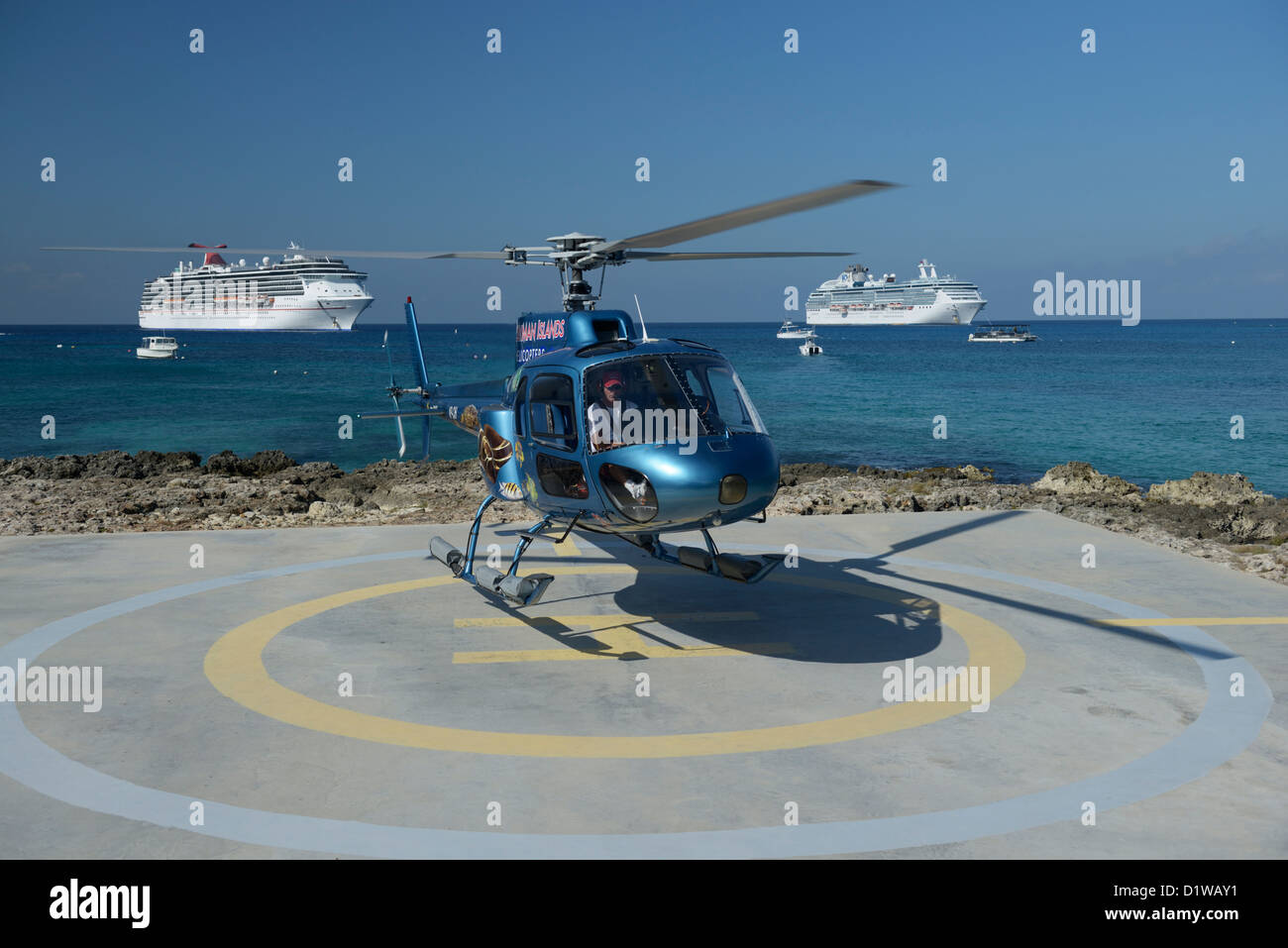 Tourist helicopter landing, Grand Cayman, Cayman Islands, British west Indies Stock Photo