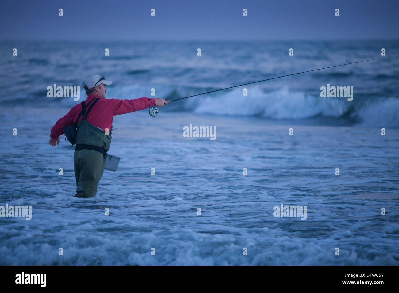 fly fishing for perch in the surf at Padaro Beach, Carpinteria, California, United States of America Stock Photo