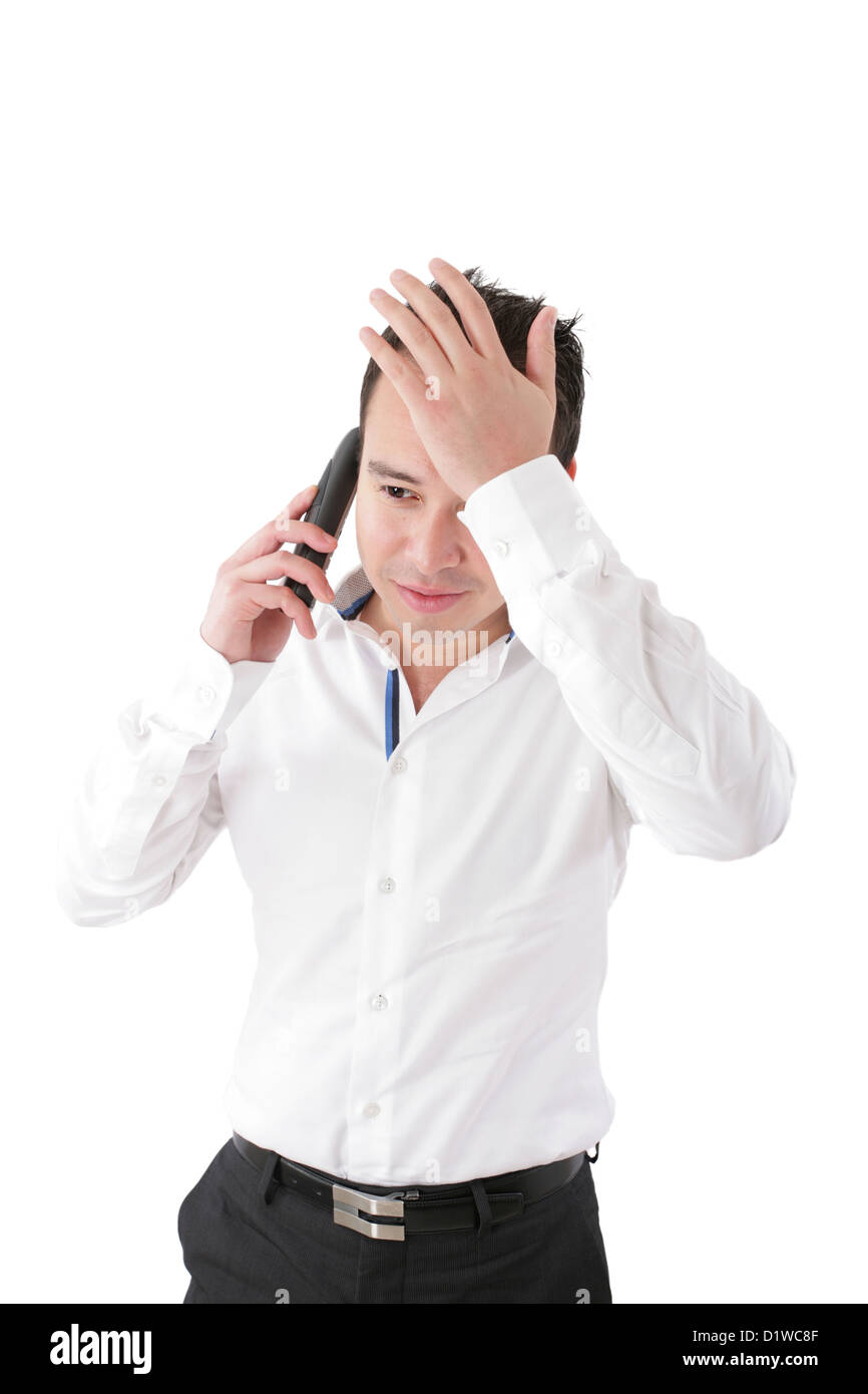 Young handsome businessman talking at the cell phone Stock Photo