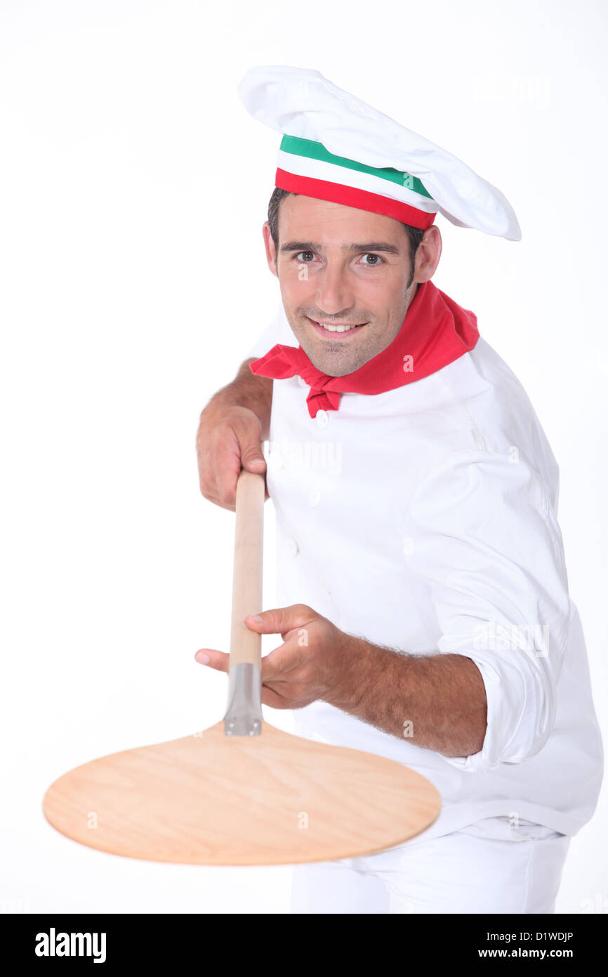 Pizza chef with a wooden peel Stock Photo Alamy