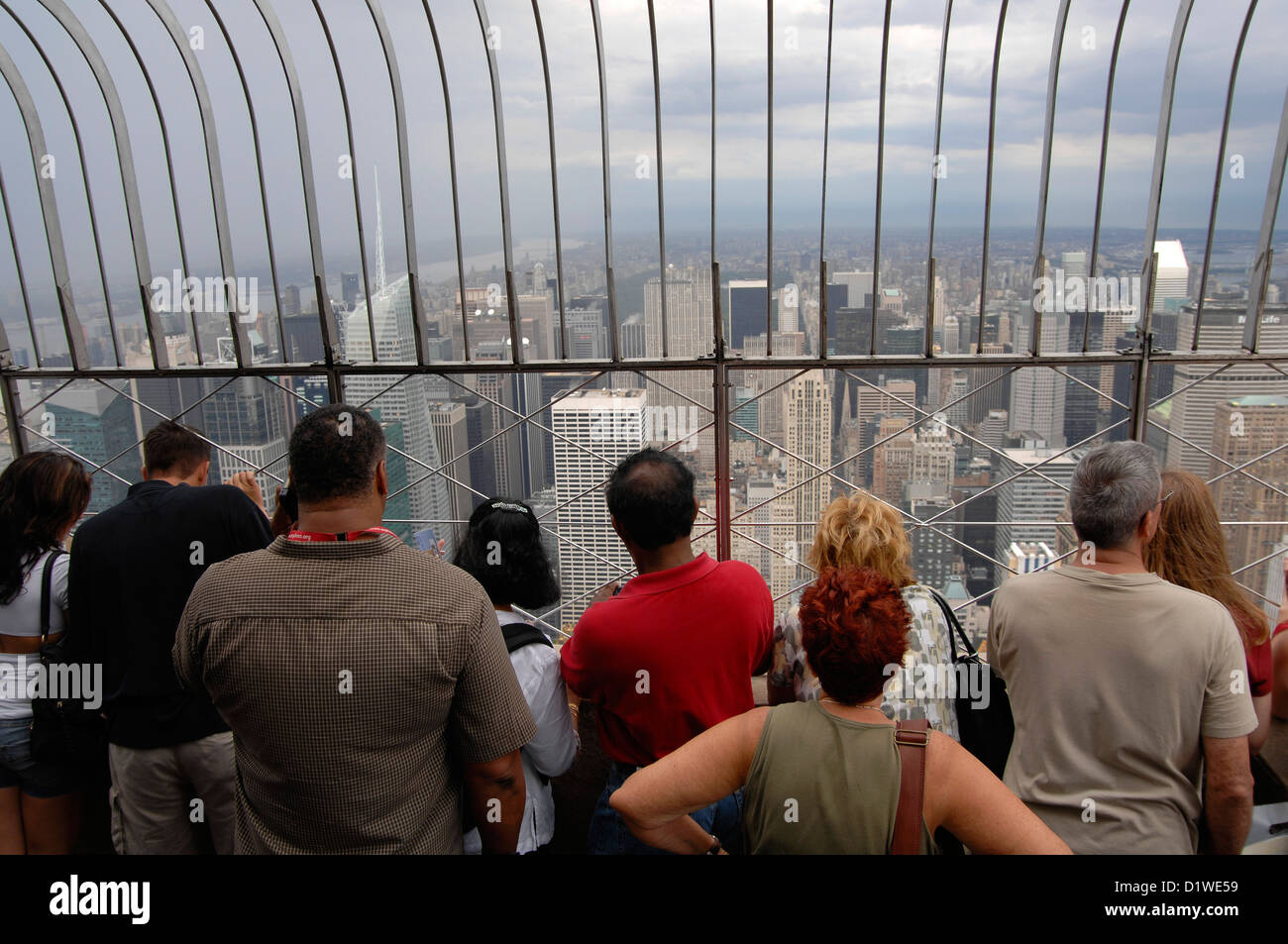 Tourists On The Roof Of The Empire State Building New York City USA tourists-on-the-roof-of-the-empire-state-building-new-york-city-usa
