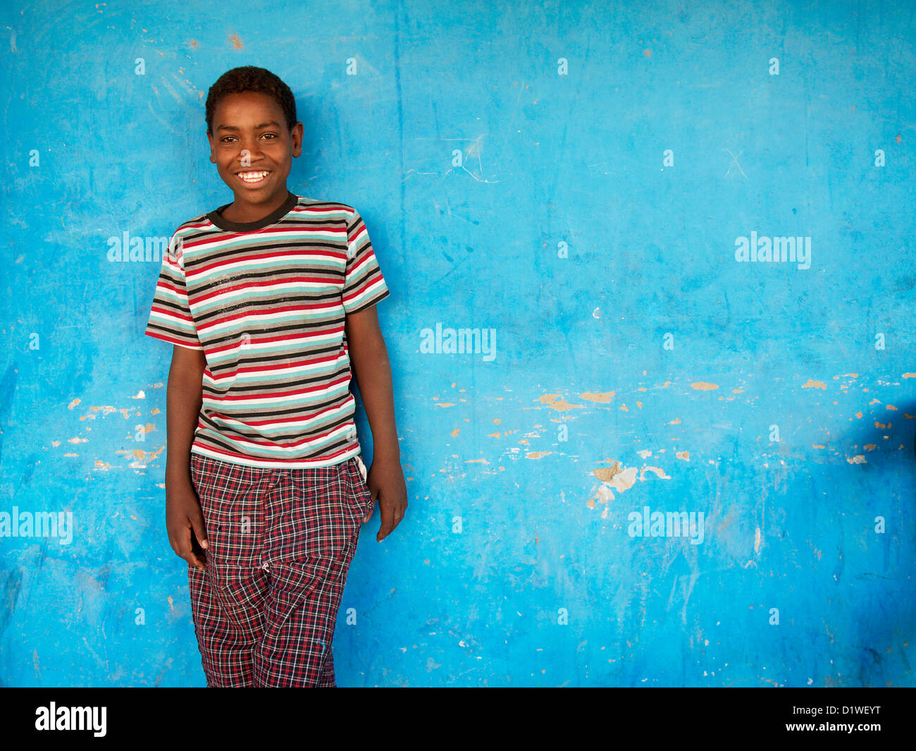 Young Sudanese boy poses for the camera in a small town north of Dongola, Sudan Stock Photo