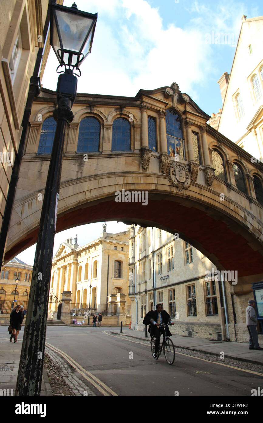 Student on bicycle under bridge of sighs oxford Stock Photo