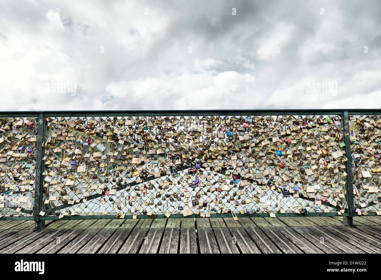 Love locks on Pont de Arts bridge in Paris with low view point Stock Photo  - Alamy