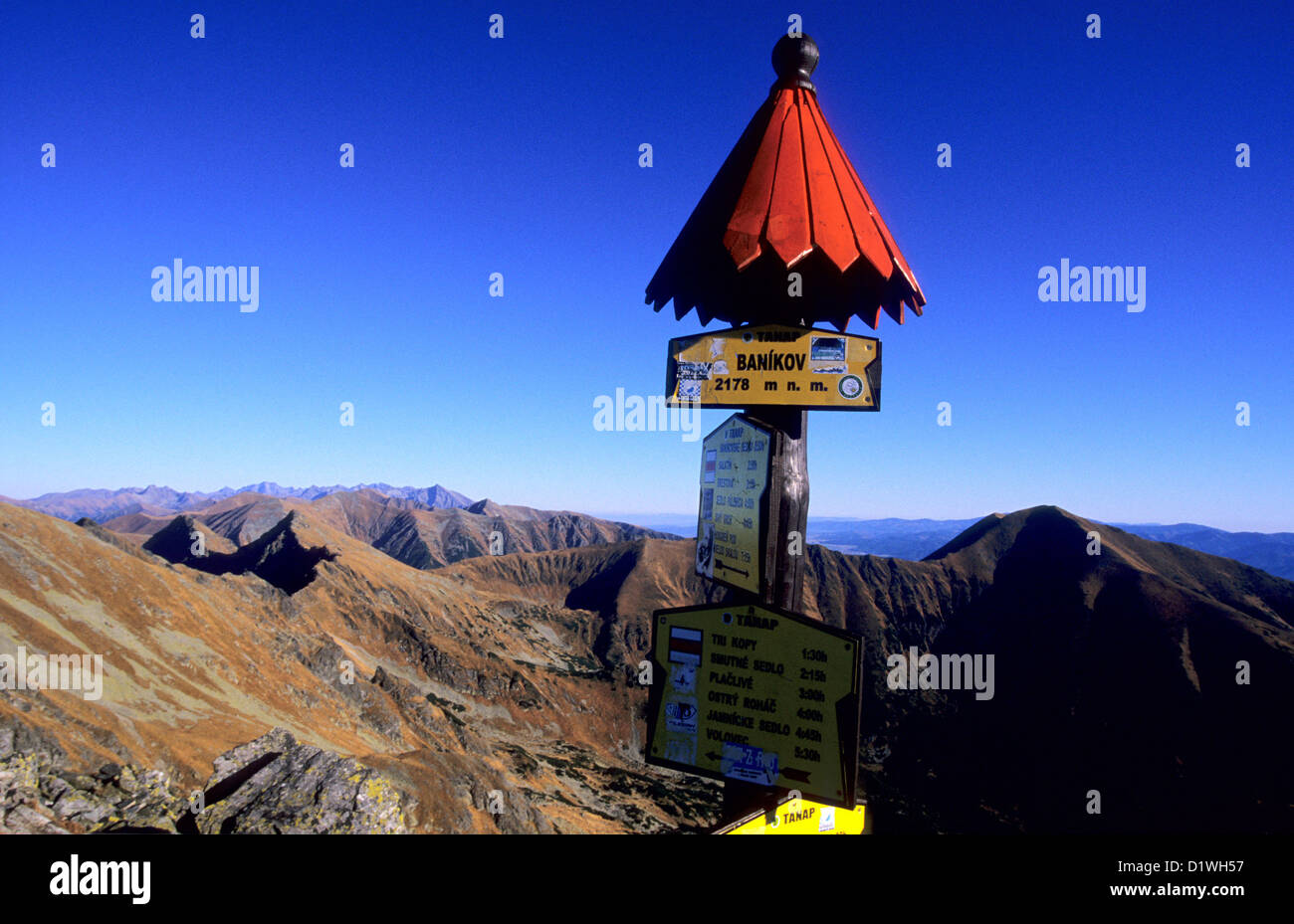 Tourist signpost at the summit of Banikov, Zapadne Tatry - Rohace, Slovakia. Stock Photo