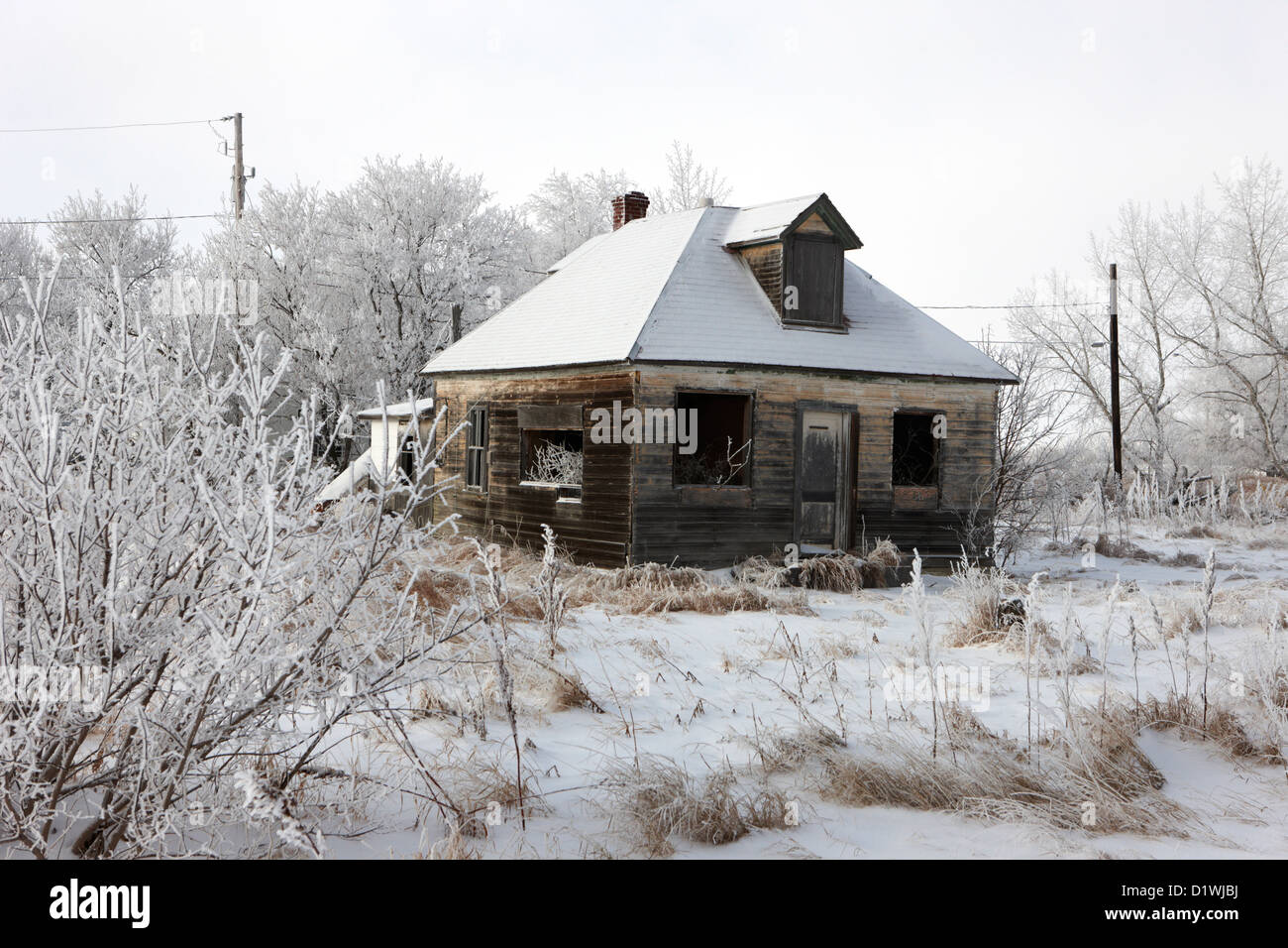 derelict empty wooden traditional house in rural village Forget Saskatchewan Canada Stock Photo