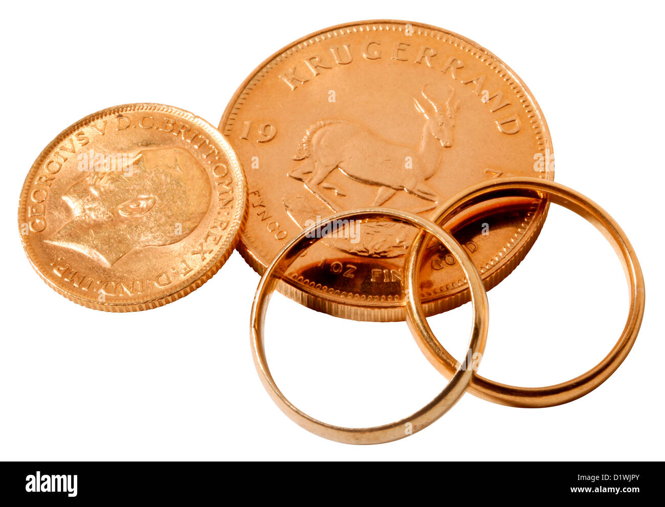 GOLD KRUGERRAND, GOLD SOVEREIGN COINS AND WEDDING RINGS Stock Photo