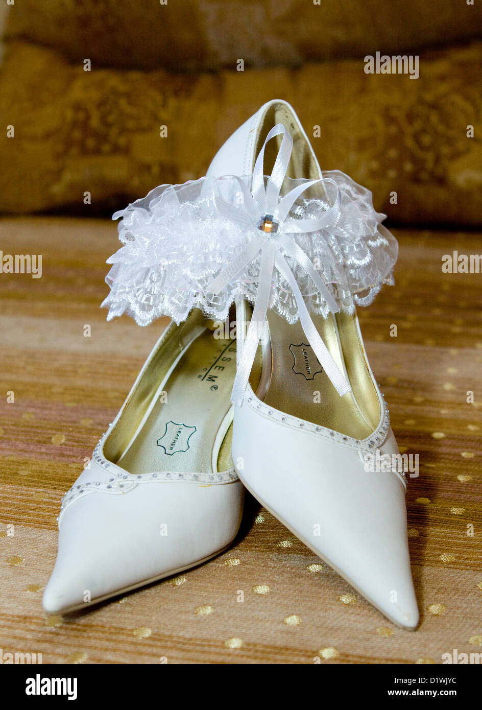Closeup of fashionable bridal wedding shoes decorated Stock Photo - Alamy