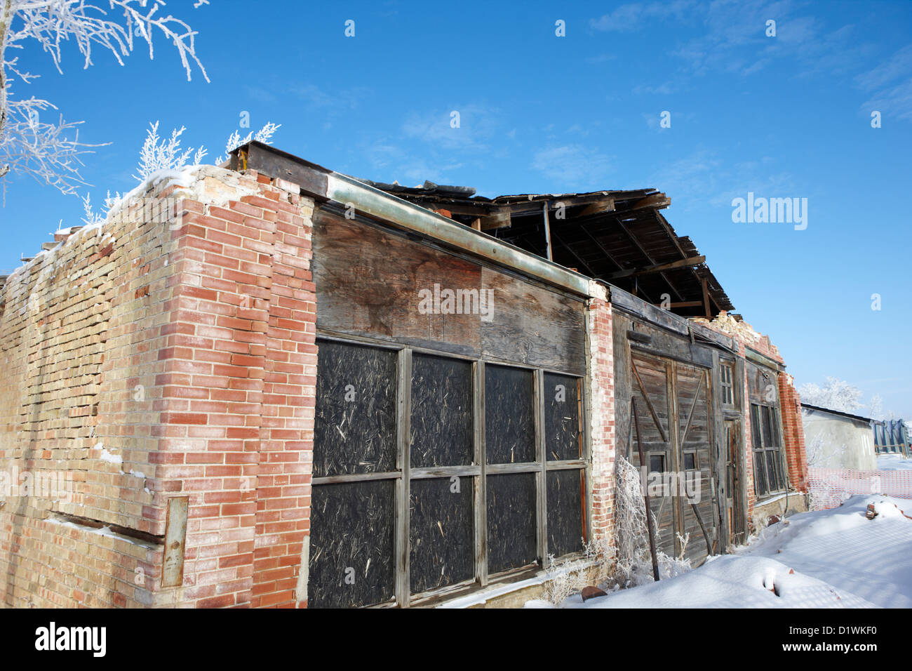 old traditional brick and wood building in disrepair Forget Saskatchewan Canada Stock Photo