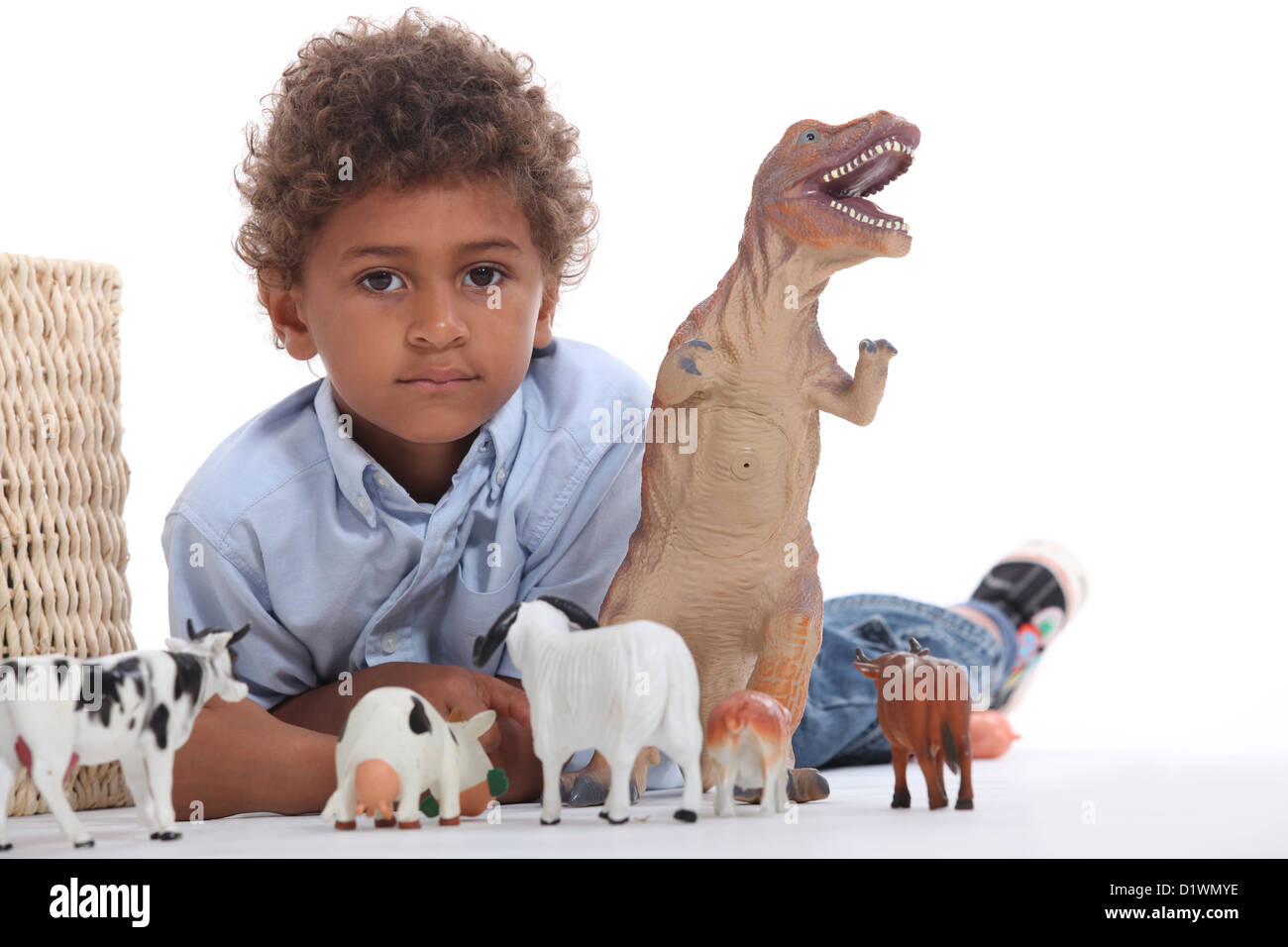 little boy playing with his toys Stock Photo - Alamy