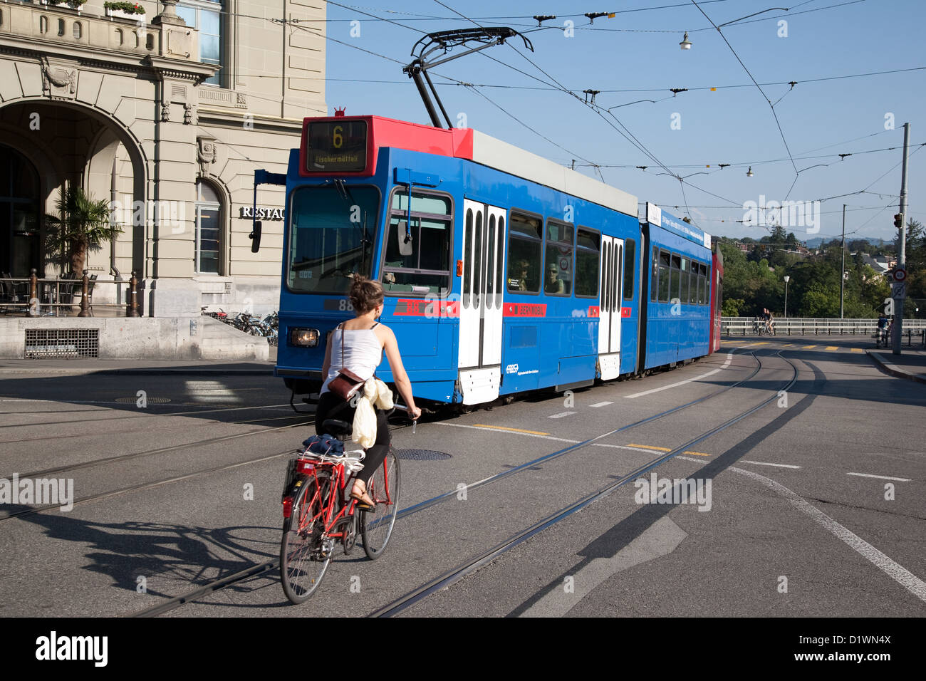 Kirchenfeldbrucke Bridge with Casino, Tram and Cyclist; Bern; Switzerland; Europe Stock Photo