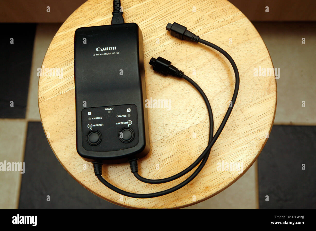 Canon camera battery charger hi-res stock photography and images - Alamy