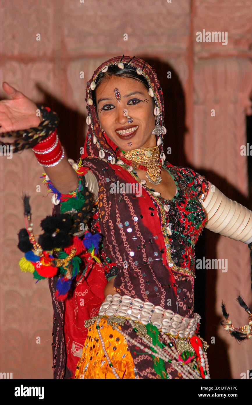 A colourful Rajasthani dancer performing a traditional folk dance at the Lalgarh Palace Hotel in Bikaner, Rajasthan, India. Stock Photo