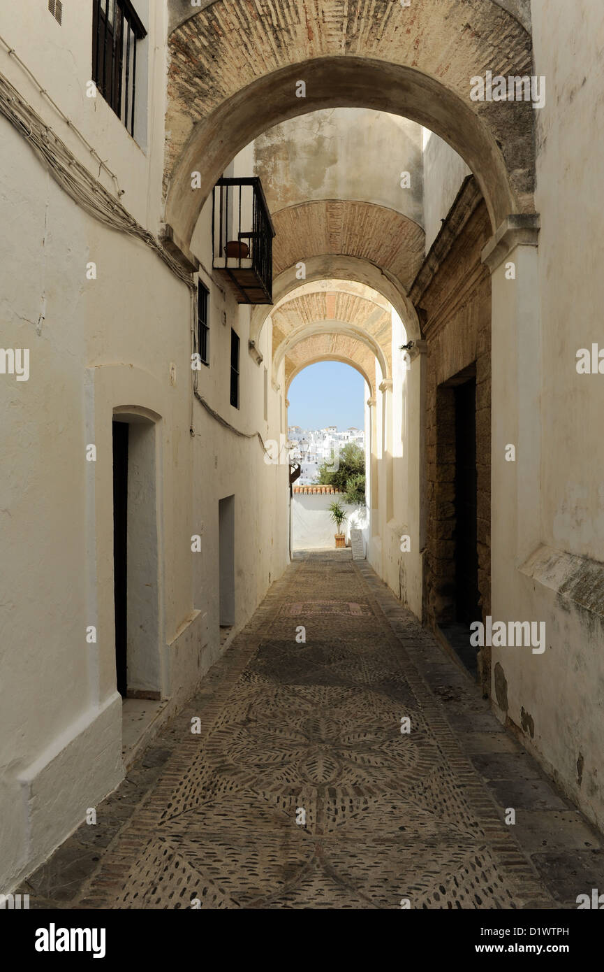 Archways and narrow streets in Vejer de la Frontera, one of the Pueblos Blancos or White Towns of Andalusia, Spain Stock Photo