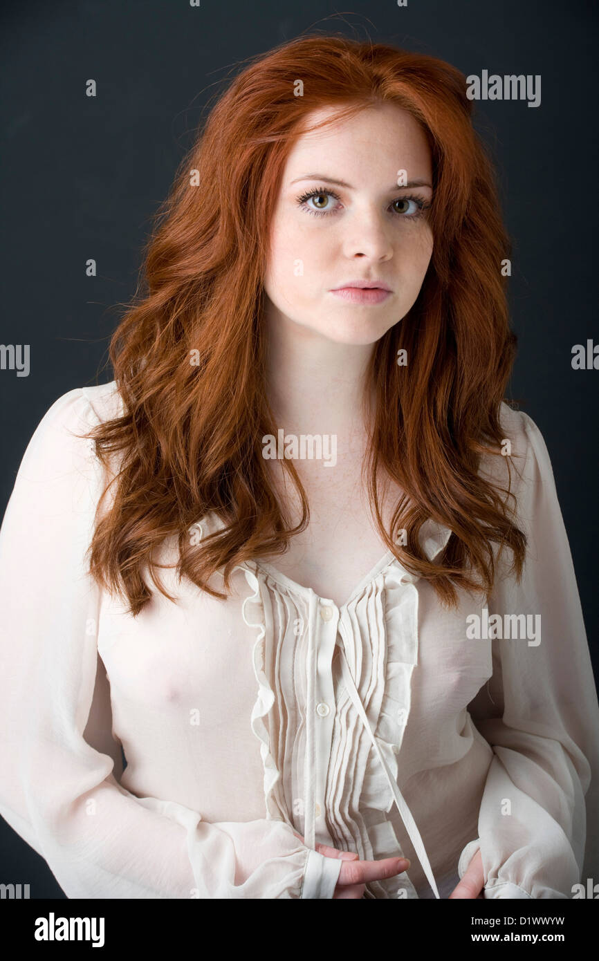 Portrait of a Scottish girl with long red hair. Stock Photo