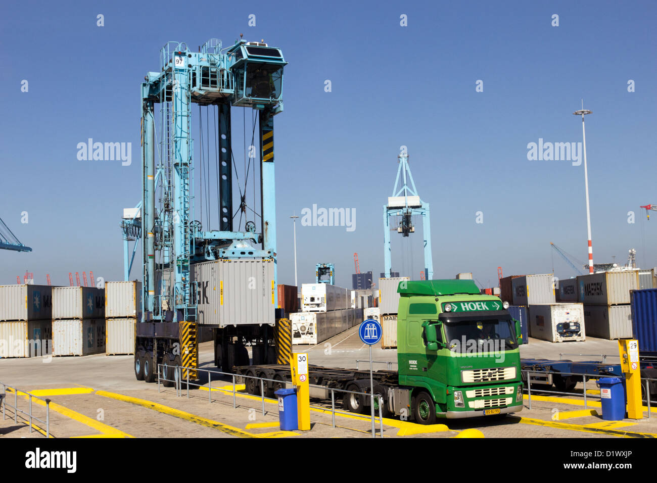 Container loaded on a trailer. Container terminal in the Rotterdam sea port. The Netherlands Stock Photo