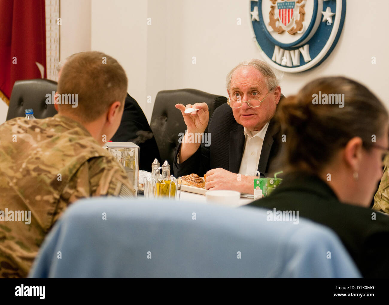 BAGRAM AIRFIELD, Afghanistan – U.S. Senator Carl Levin, a senator for the state of Michigan, shares a meal with U.S. Soldiers attached to Combined Joint Task-1, 1st Infantry Division, during a constituent breakfast at Bagram Airfield, Afghanistan, Jan. 7, 2013. Levin and U.S. Senator Jack Reed, senior state senator for Rhode Island, visited troops from their respective states to boost morale and discuss U.S. efforts in Afghanistan. (U.S. Army photo by Sgt. Christopher Bonebrake, 115th Mobile Public Affairs Detachment) Stock Photo