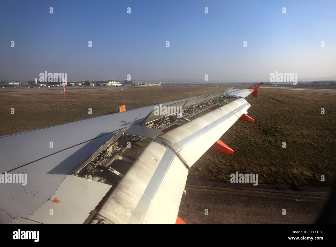 View from aeroplane window of Easyjet logo and wingtip Stock Photo