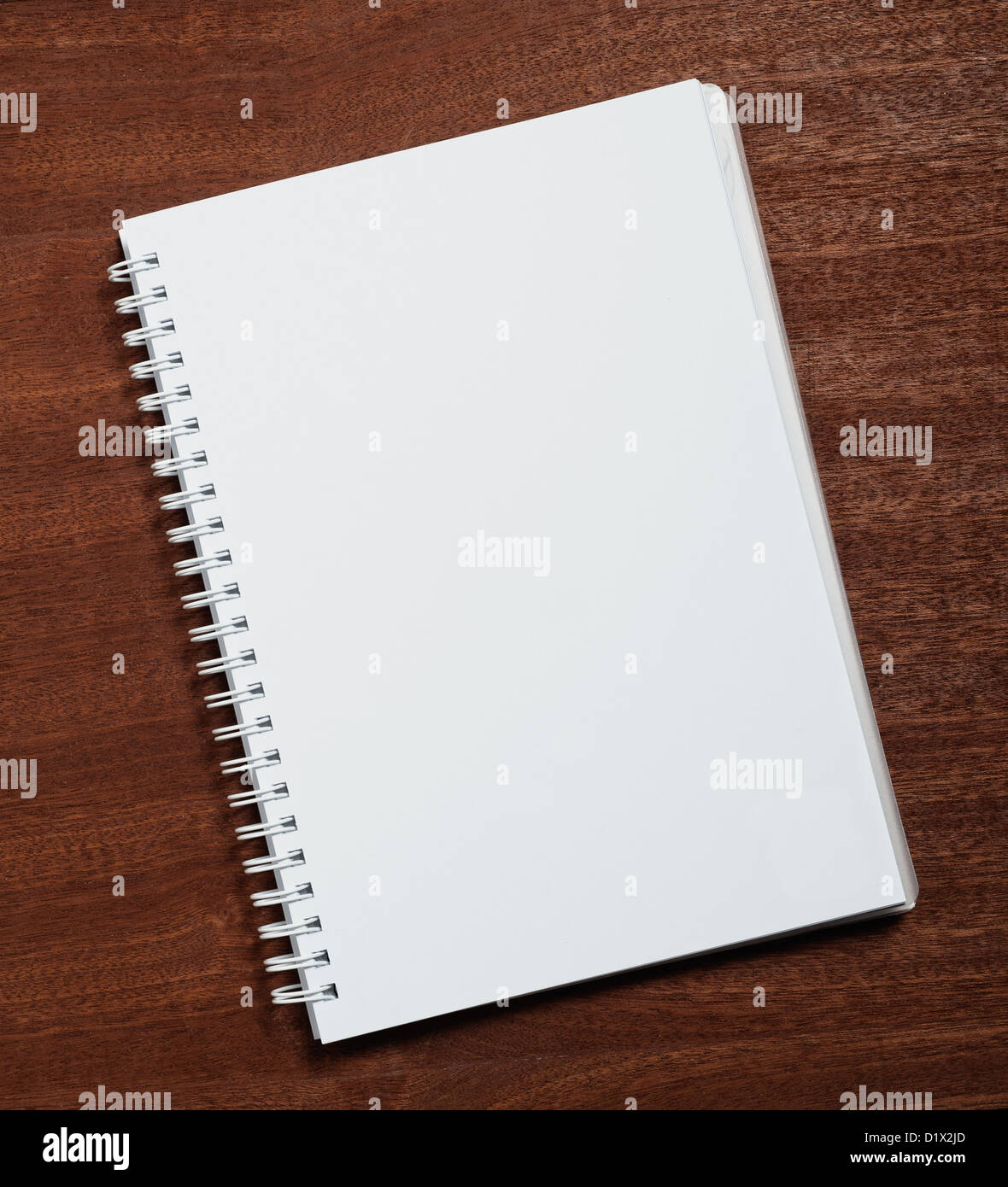 Notebook on wooden background. Stock Photo