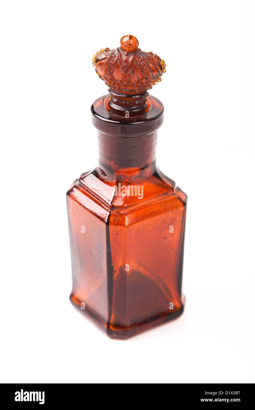 glass brown retro bottle with ground-in stopper crown Stock Photo