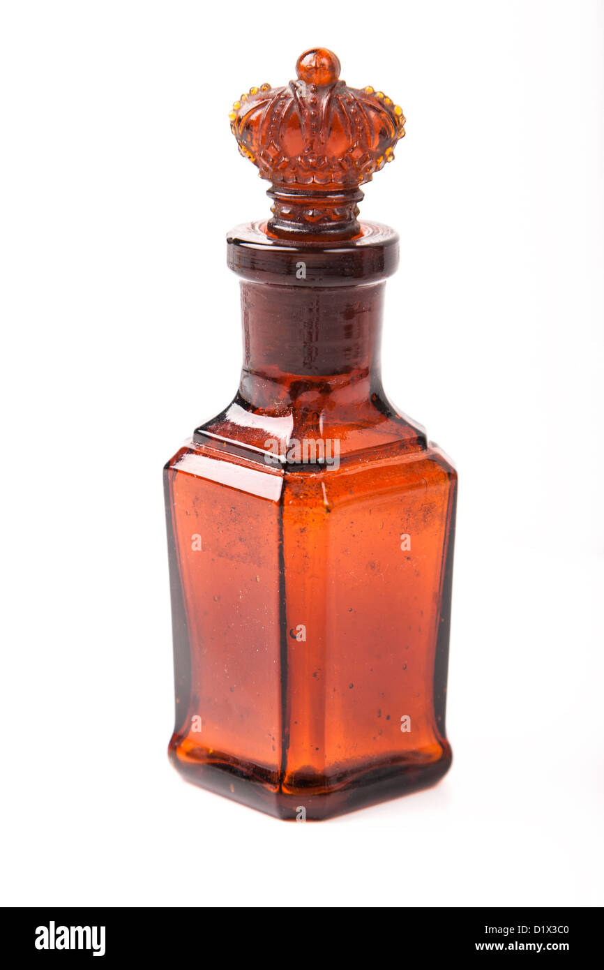 glass brown retro bottle with ground-in stopper crown Stock Photo