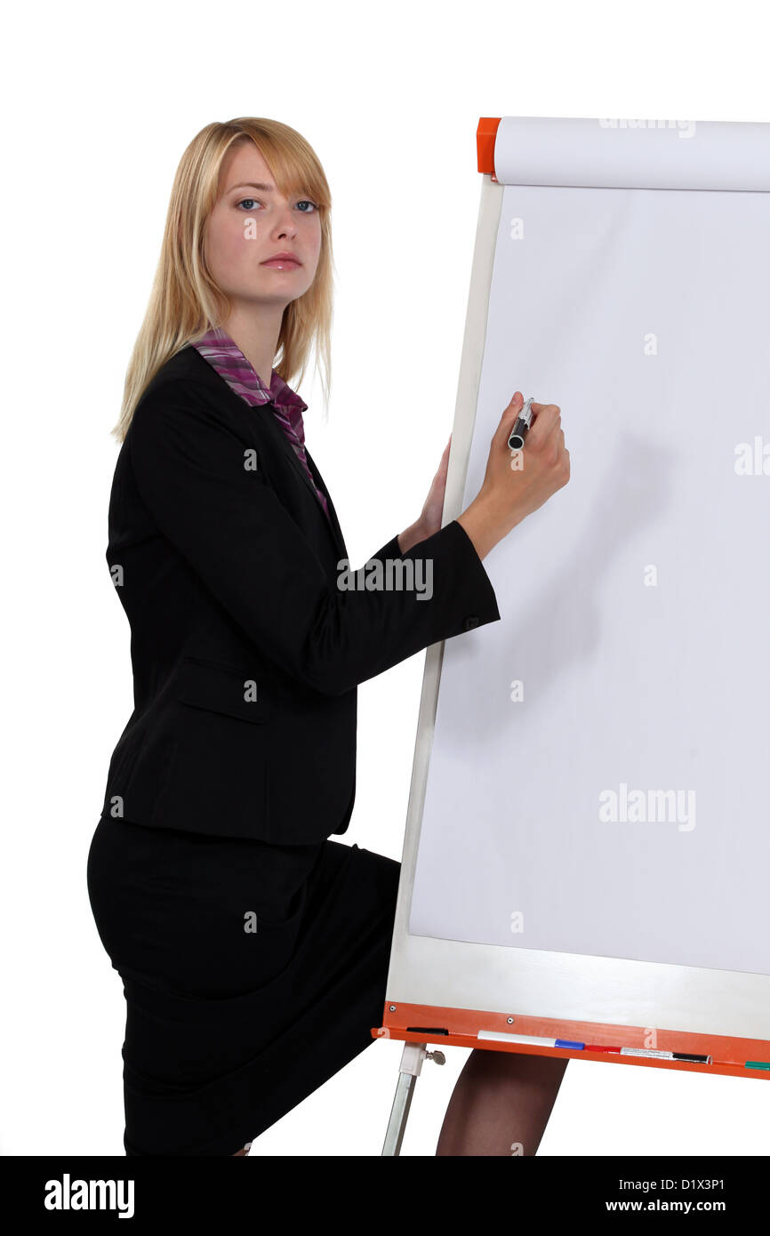 businesswoman writing with a marker on a board Stock Photo