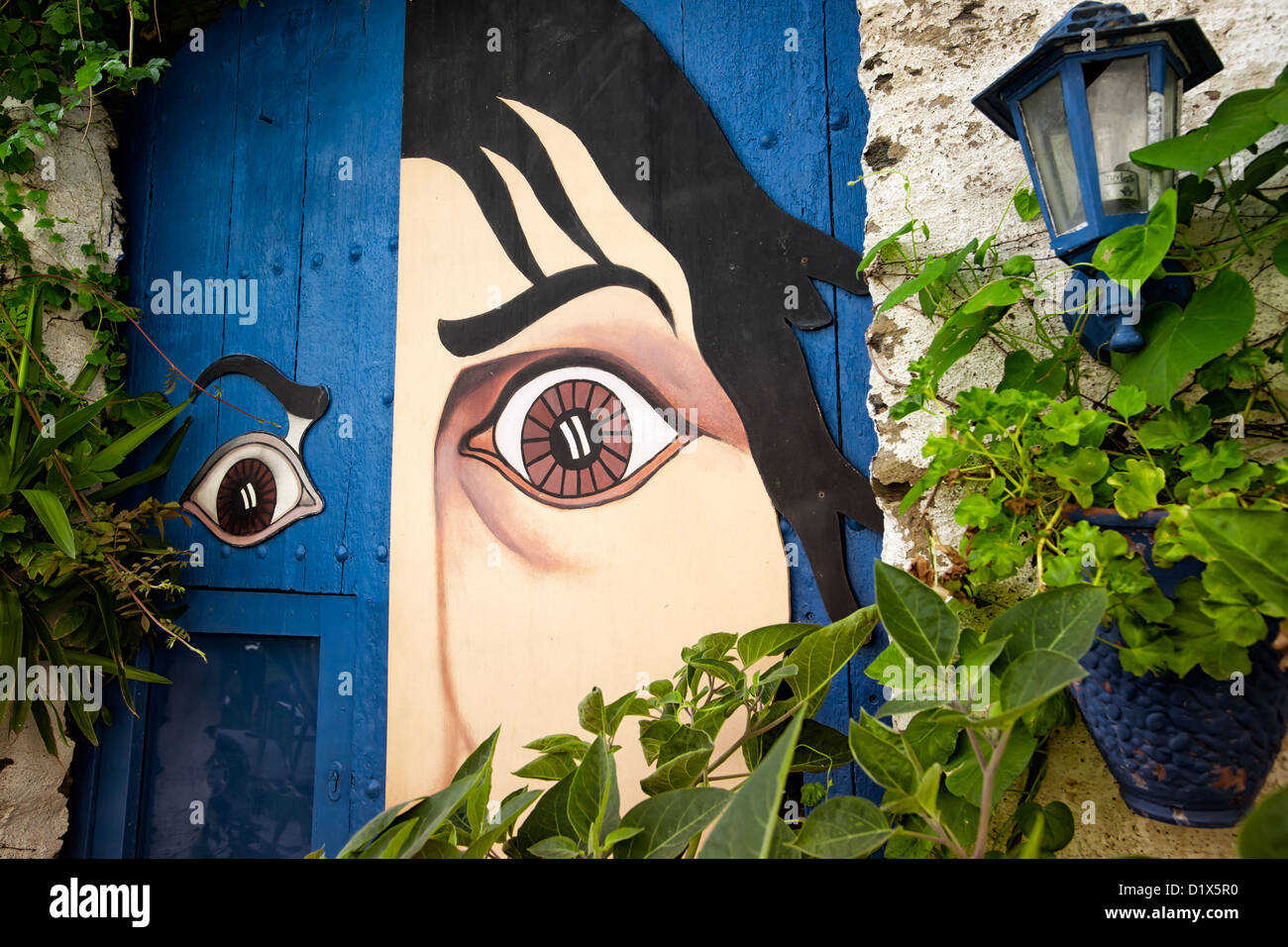 Detail of a door styled with Salvador Dali's portrait Stock Photo