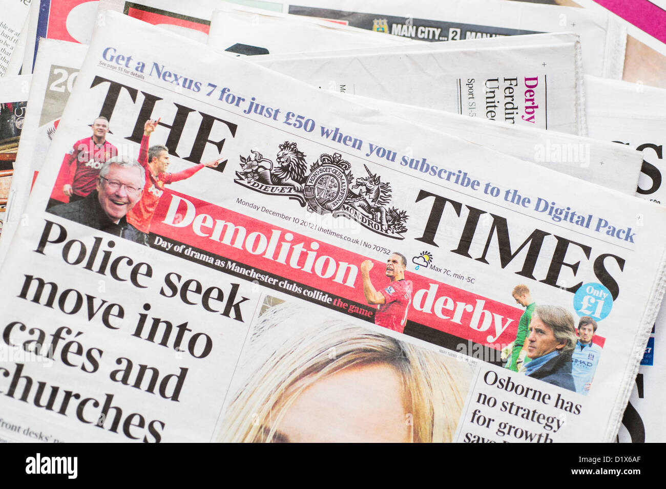 The front pages and mastheads of UK British English daily national newspaper The Times Stock Photo