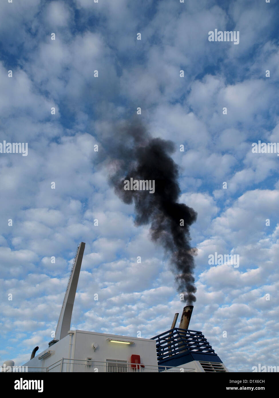 Smoke from the engines of a Scottish Ferry, as it leaves port in the Orkney Islands Stock Photo