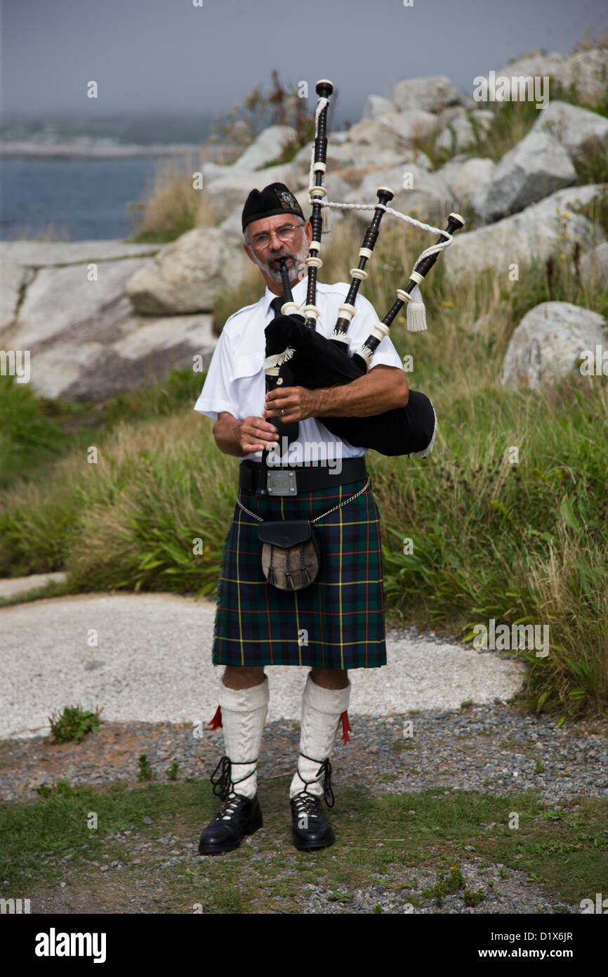 Piper, Aspy Luison, bagpipes, The Real McKenzies, Canadian Celtic punk band  in concert Stock Photo - Alamy