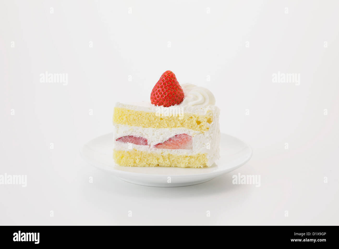 Slice of strawberry shortcake Stock Photo