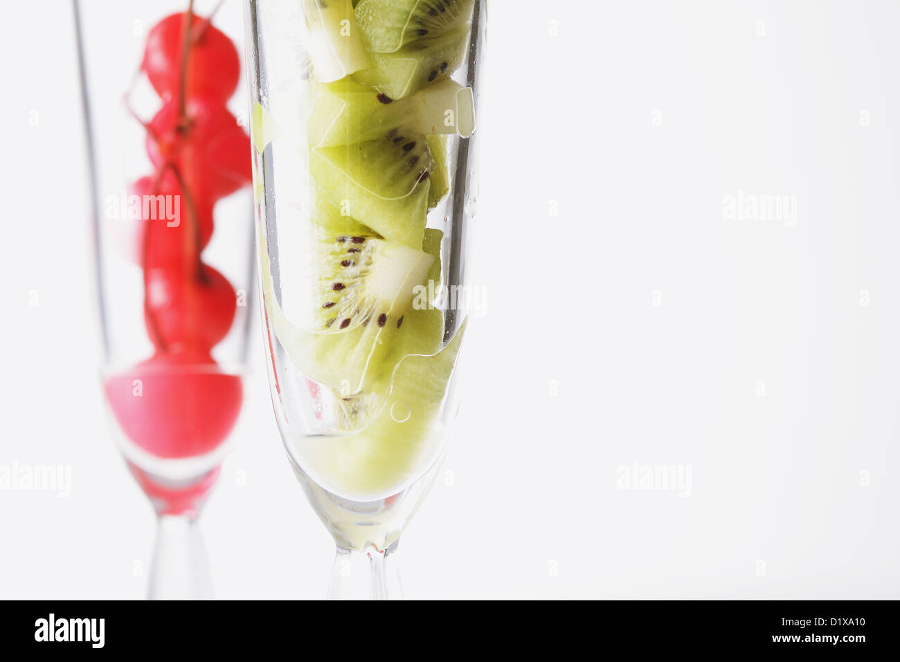 Cut fruits in Champagne glasses Stock Photo