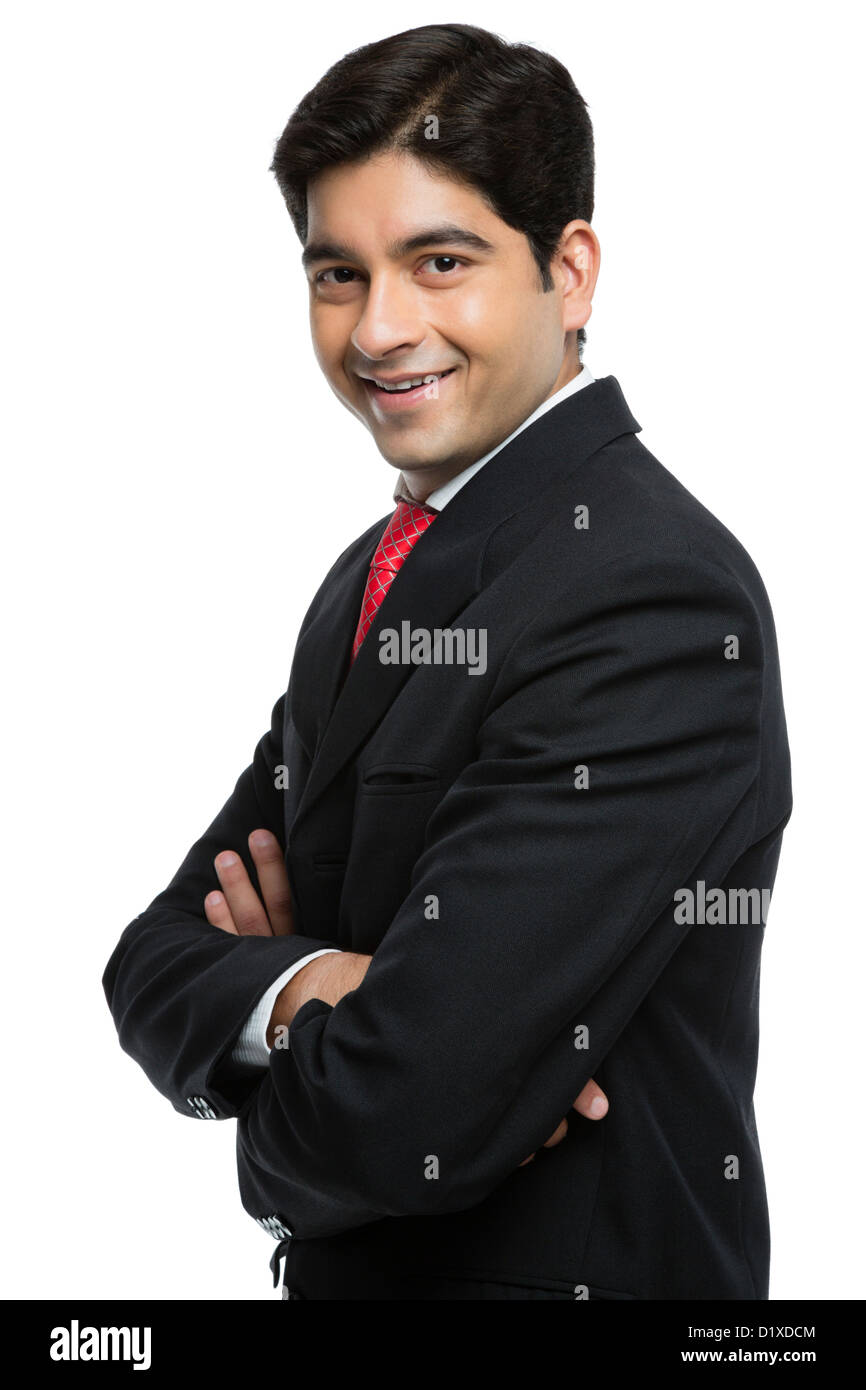Portrait of a businessman standing with arms crossed and smiling Stock ...