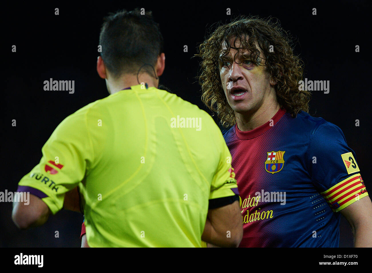 Carles Puyol (FC Barcelona) talk with the referee, during La Liga soccer match between FC Barcelona and RCD Espanyol, at the Camp Nou stadium in Barcelona, Spain, Sunday, January 6, 2013. Foto: S.Lau Stock Photo