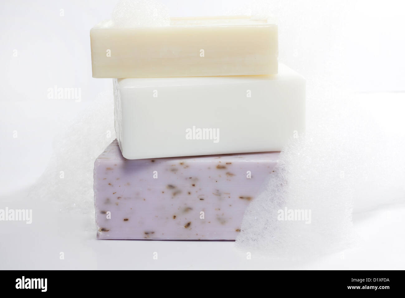 Soap with foam in the bath  on white Stock Photo