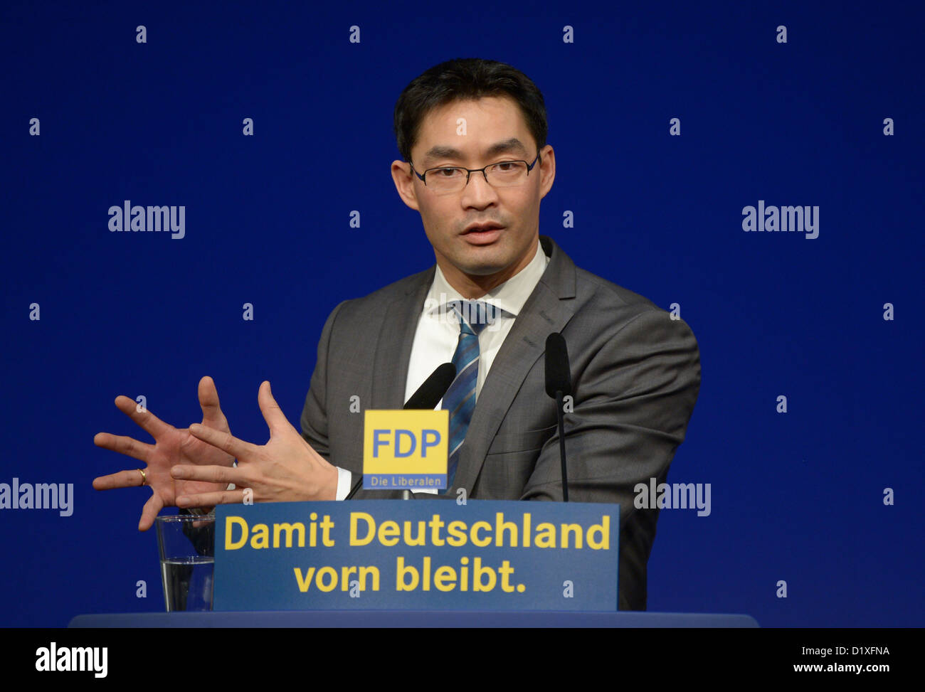 The chairman of the FDP, Philipp Roesler, delivers a speech during the annual Epiphany party conference of the FDP in Stuttgart, Germany, 6 January 2013. Photo: Michael Kappeler Stock Photo
