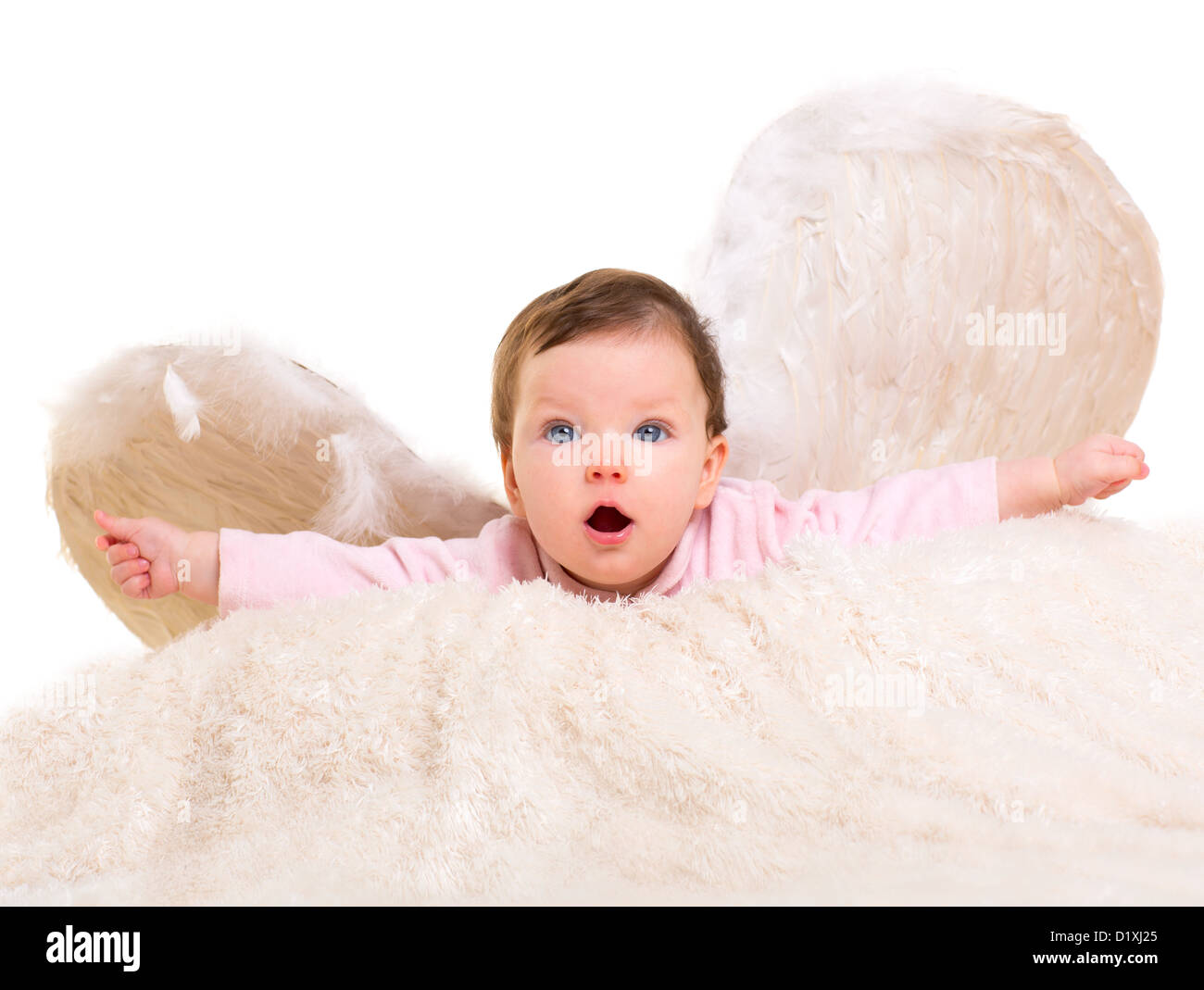 baby girl angel with feather white wings on white fur and open arms Stock Photo