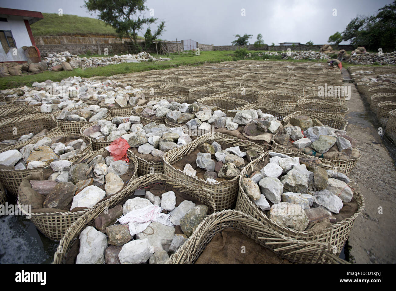 Baskets with Supari. (areca nut ) Stones on top. Cherrapunjee, Meghalay, India Stock Photo