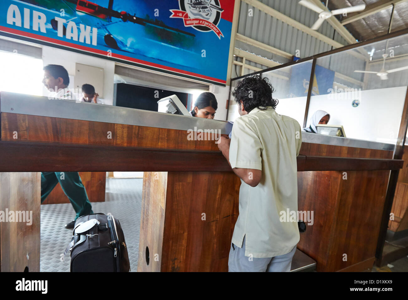 Maldivian Air Taxi sea plane check -in desk at Malé International ...