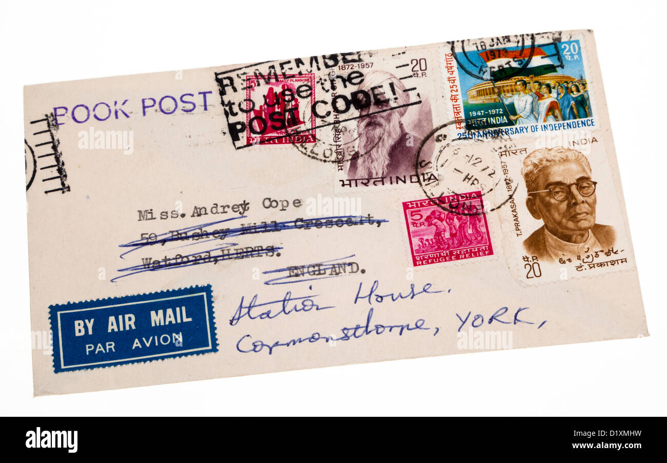 Old franked 1972 envelope posted in India and redirected as collected by philatelists UK Stock Photo