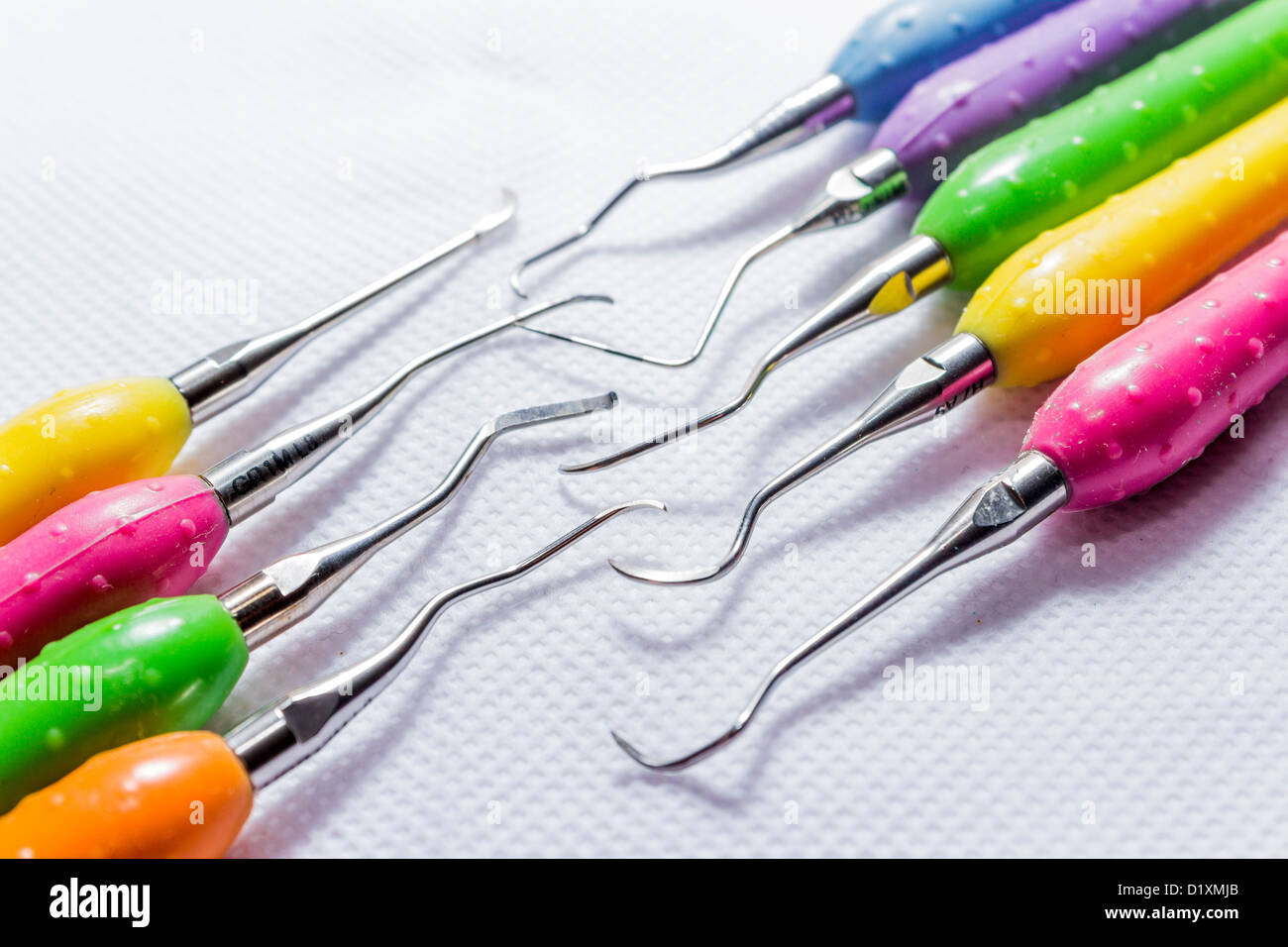 Collection of colorful dental scalers with mirror used in dental
