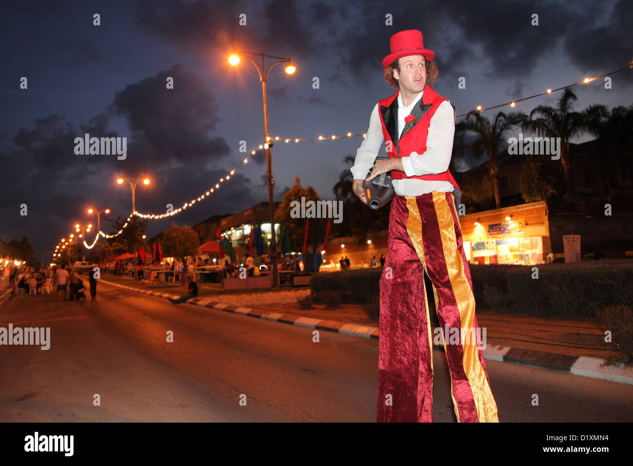 Clown on stilts at a festival. Photographed in Israel at Kfar Yona Stock Photo