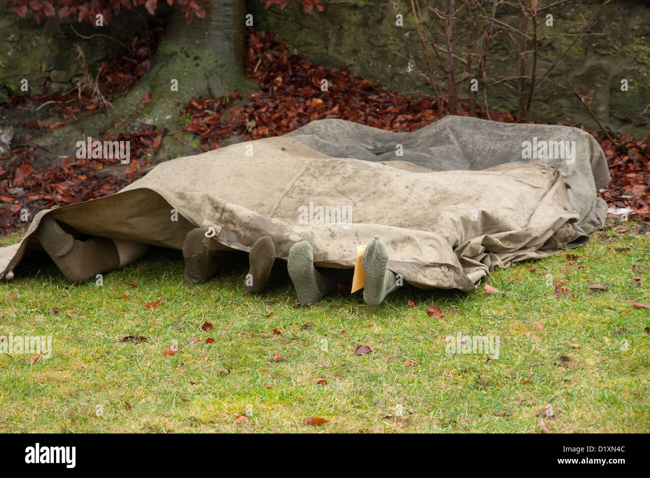 dead bodies covered with cloth Stock Photo