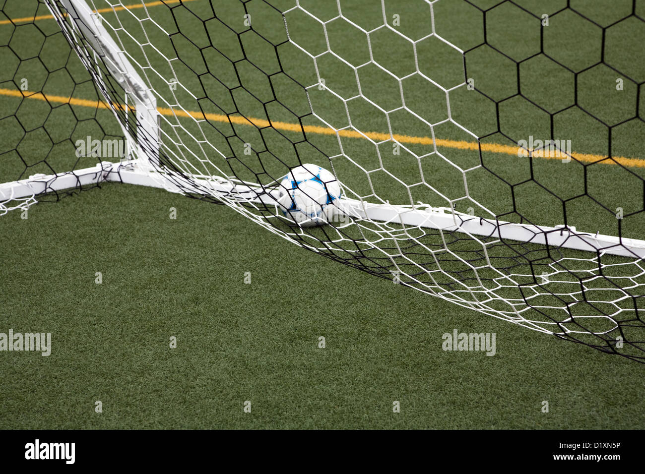Soccer Ball in Goal Stock Photo Alamy