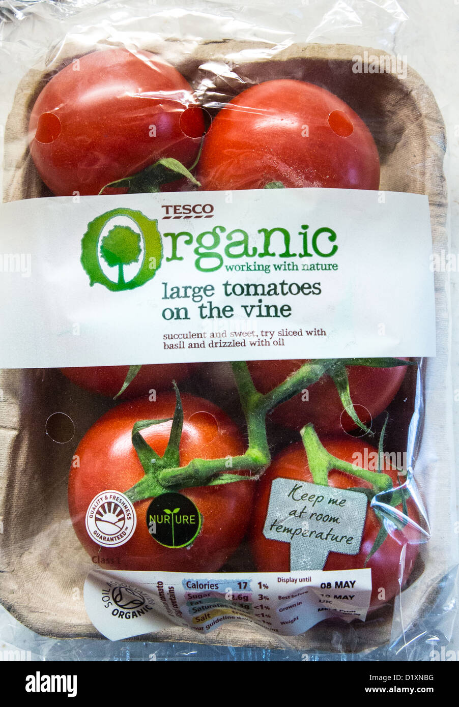 Pack of Tesco organic large tomatoes on the vine sealed in plastic Stock  Photo - Alamy