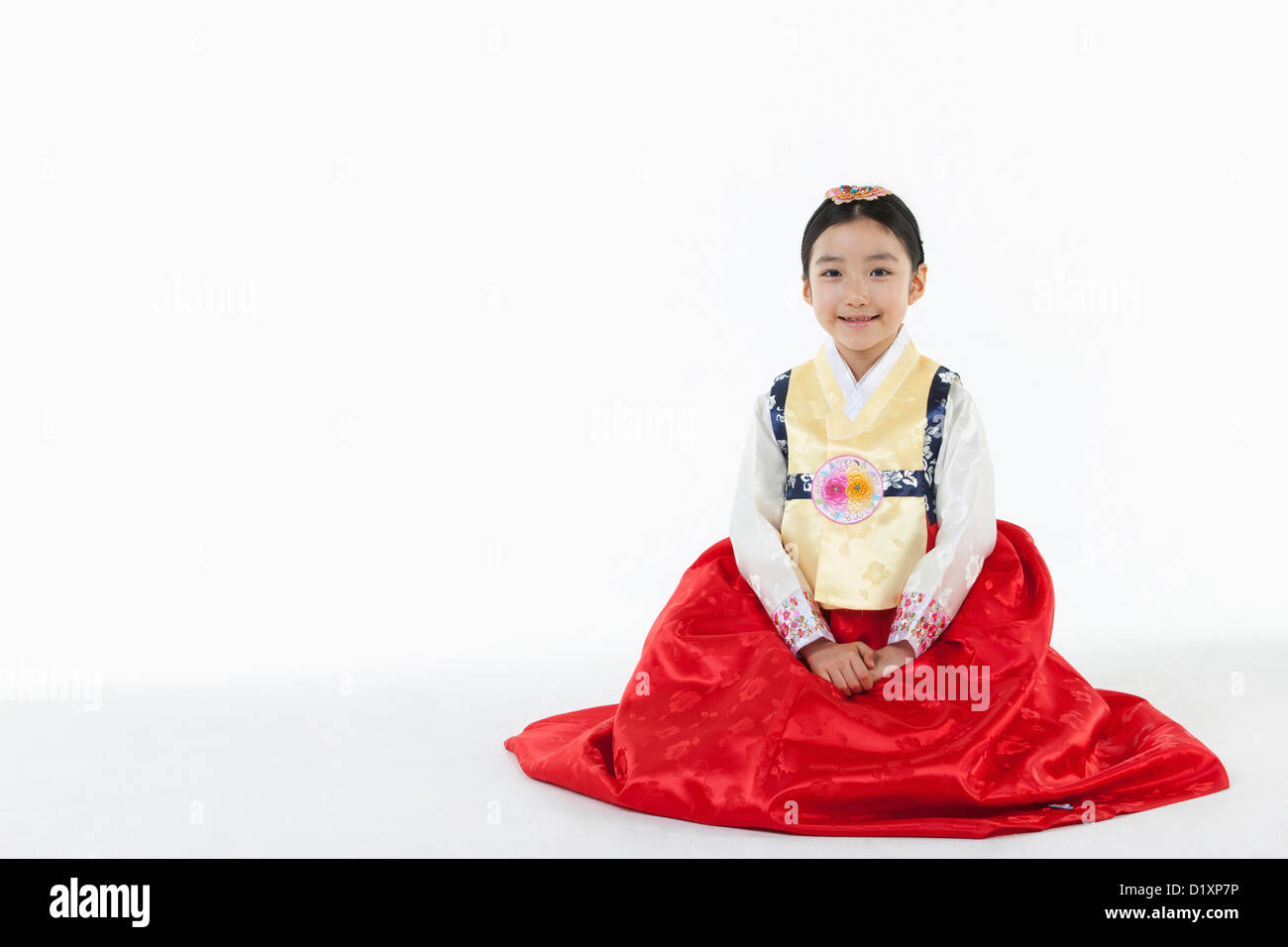 Woman in Dress Sitting On Floor