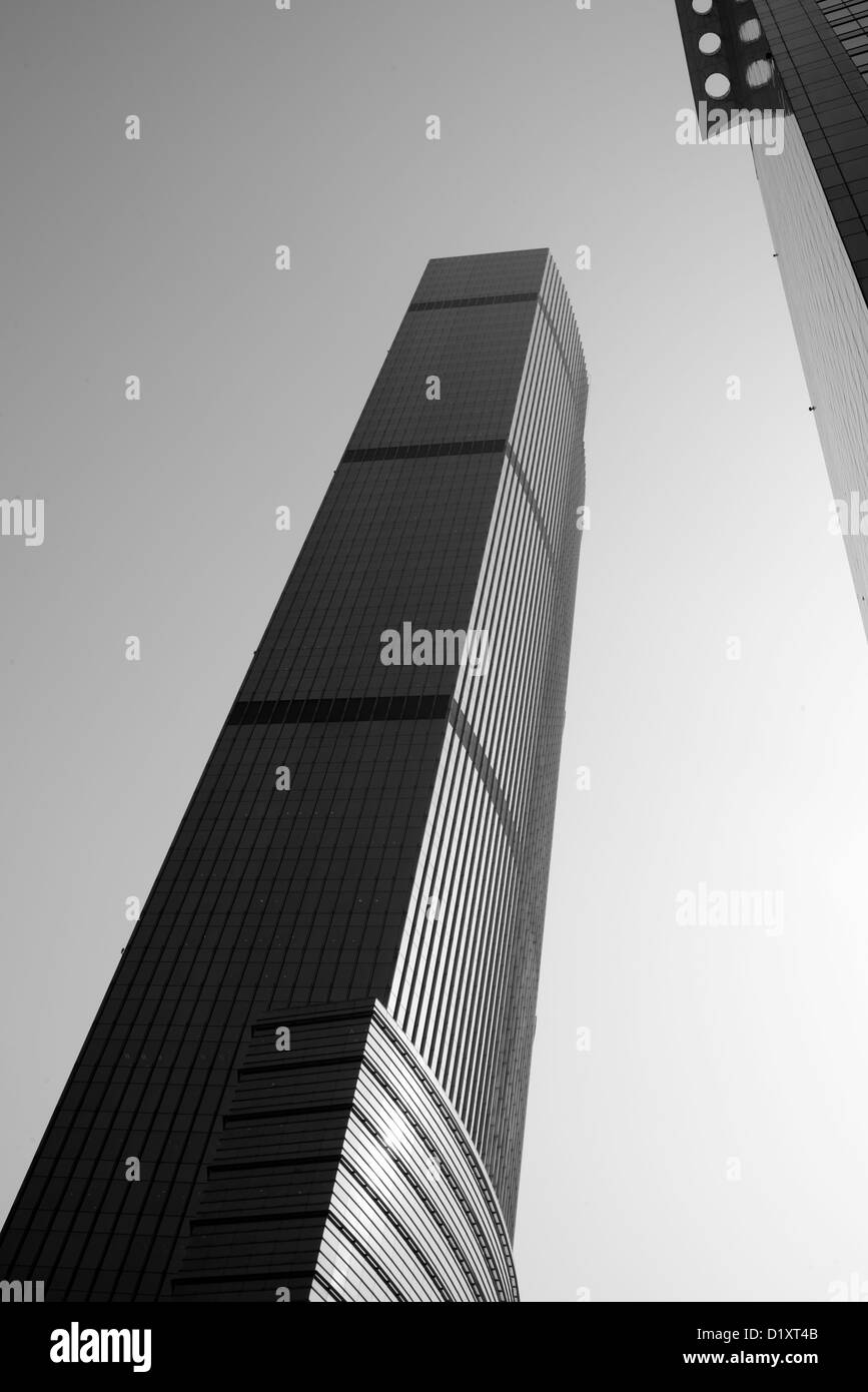 Tall high rise building of Shanghai City with steel and glass architecture design in black and white. Stock Photo
