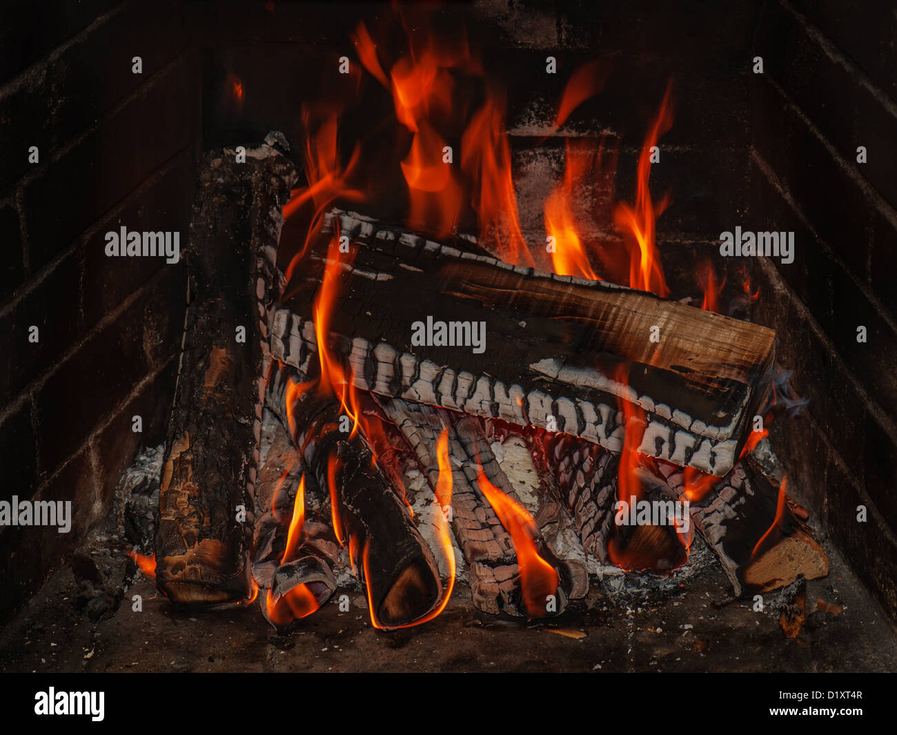 fireplace with wood and fire Stock Photo Alamy